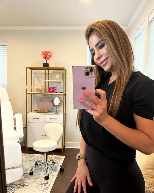 Angie in the Glow RN Studio treatment room